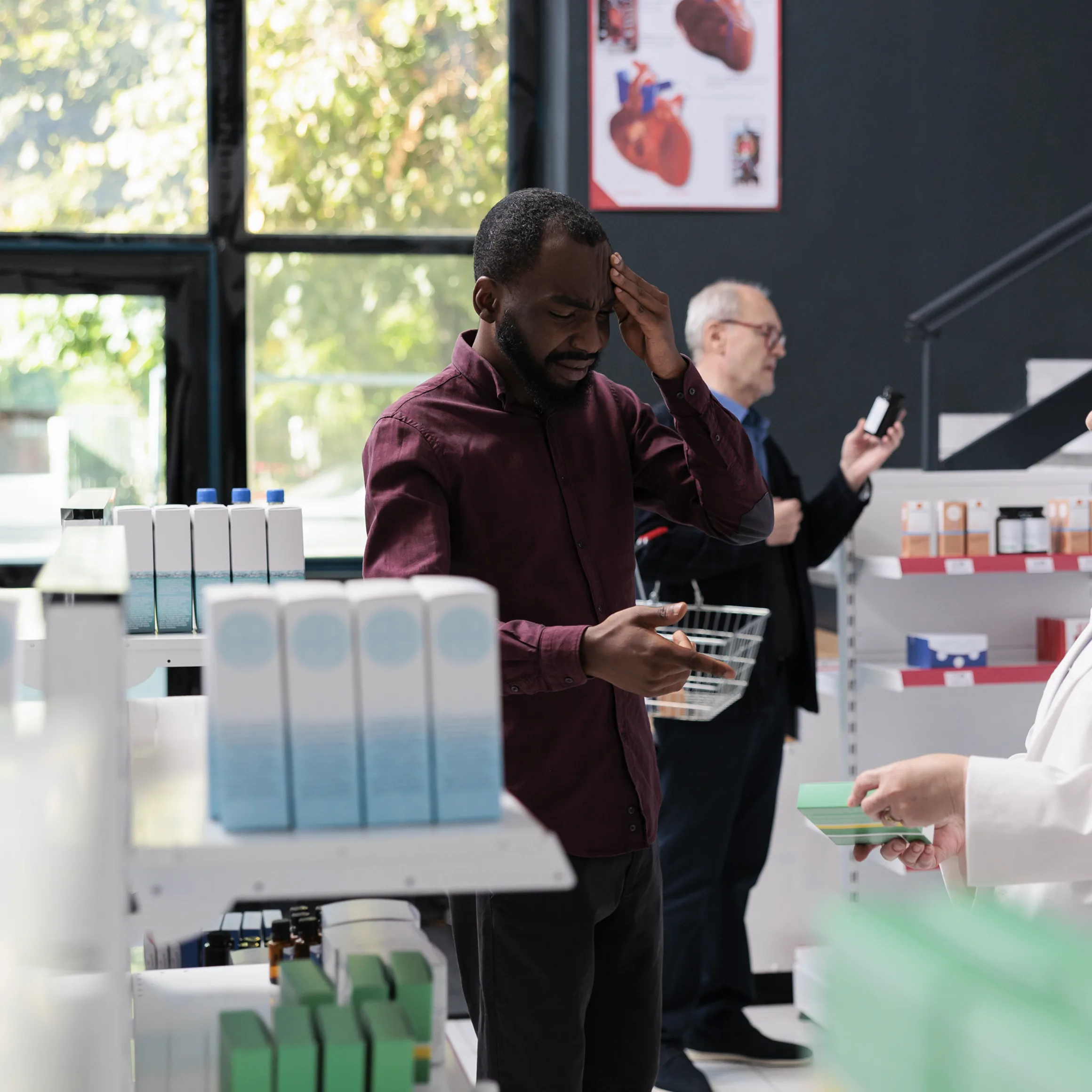 Customer and pharmacist at a pharmacy counter